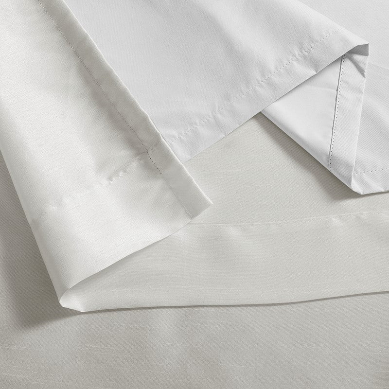 Emilia 100% Polyester Solid Faux Silk Lined Twist Tab Total Blackout Window Curtain