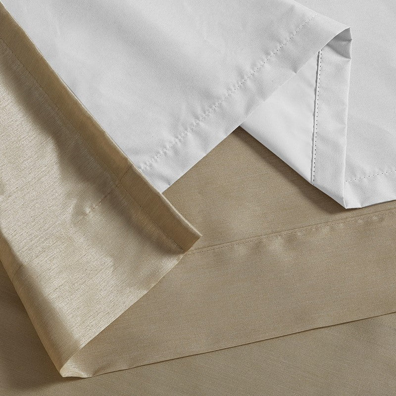 Emilia 100% Polyester Solid Faux Silk Lined Twist Tab Total Blackout Window Curtain